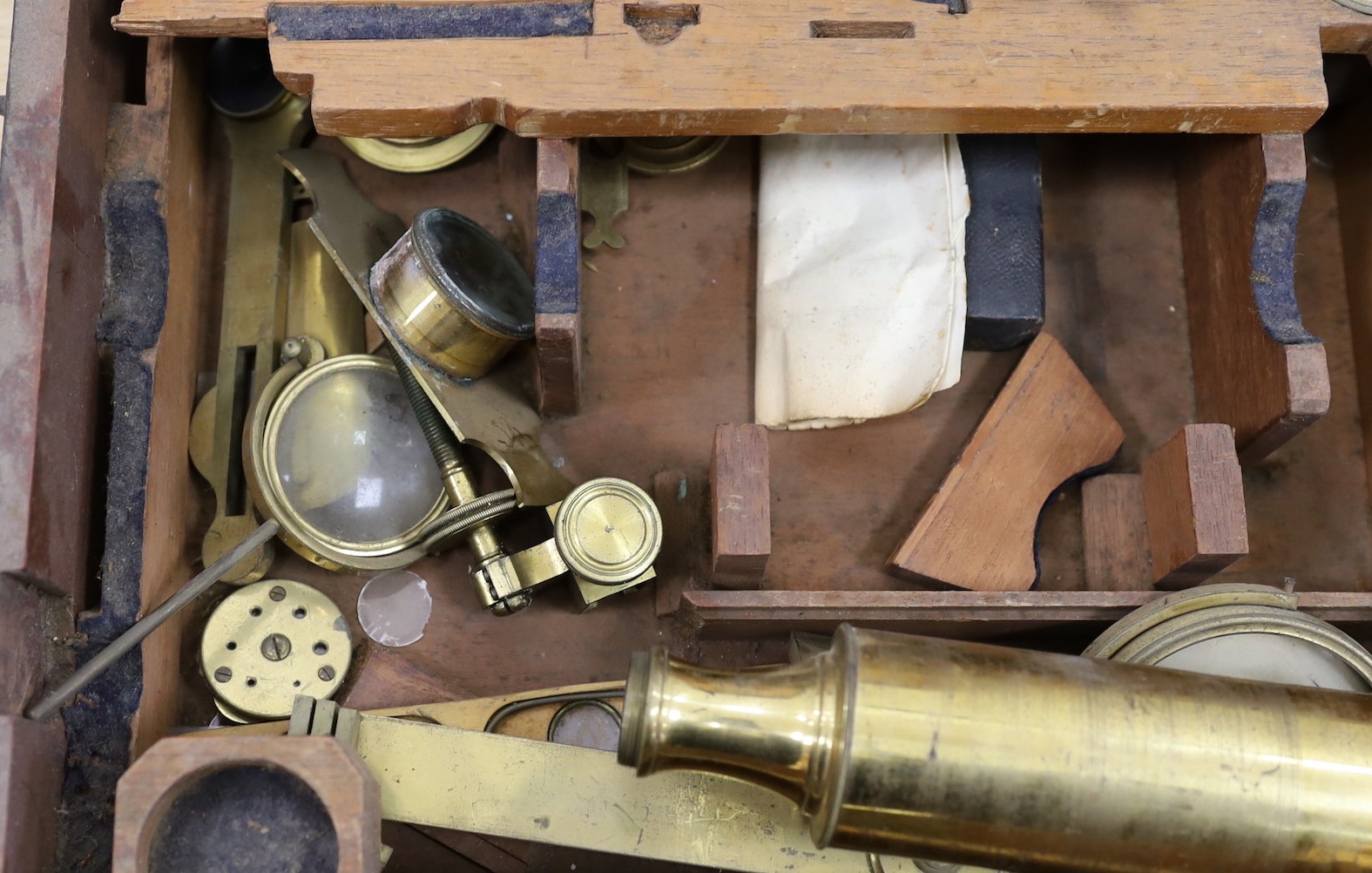 A 19th century cased brass monocular microscope